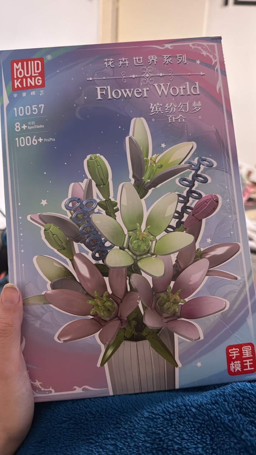 MULDKING Flower World Set 10057 mit bunten Blumen und Bauteilen in einer Verpackung.